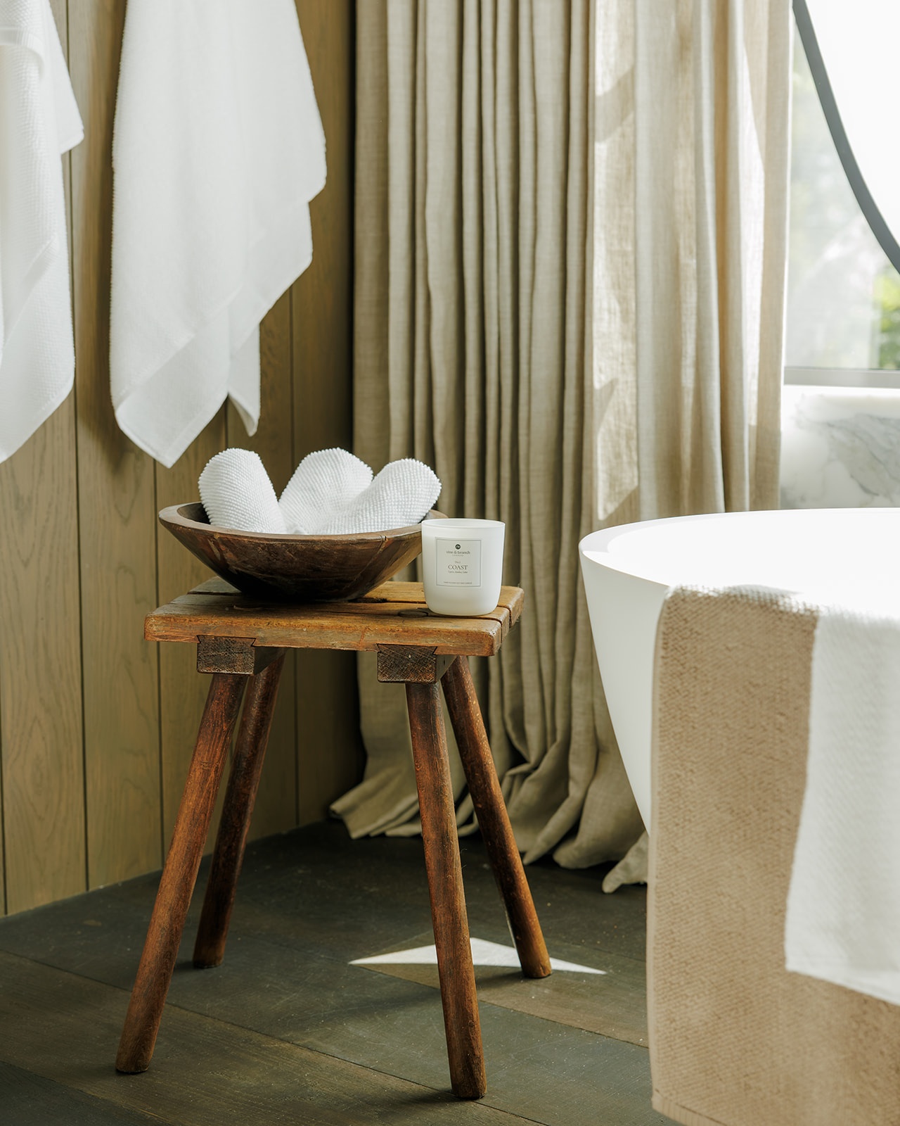 Vine & Branch candle in a styled bathroom setting